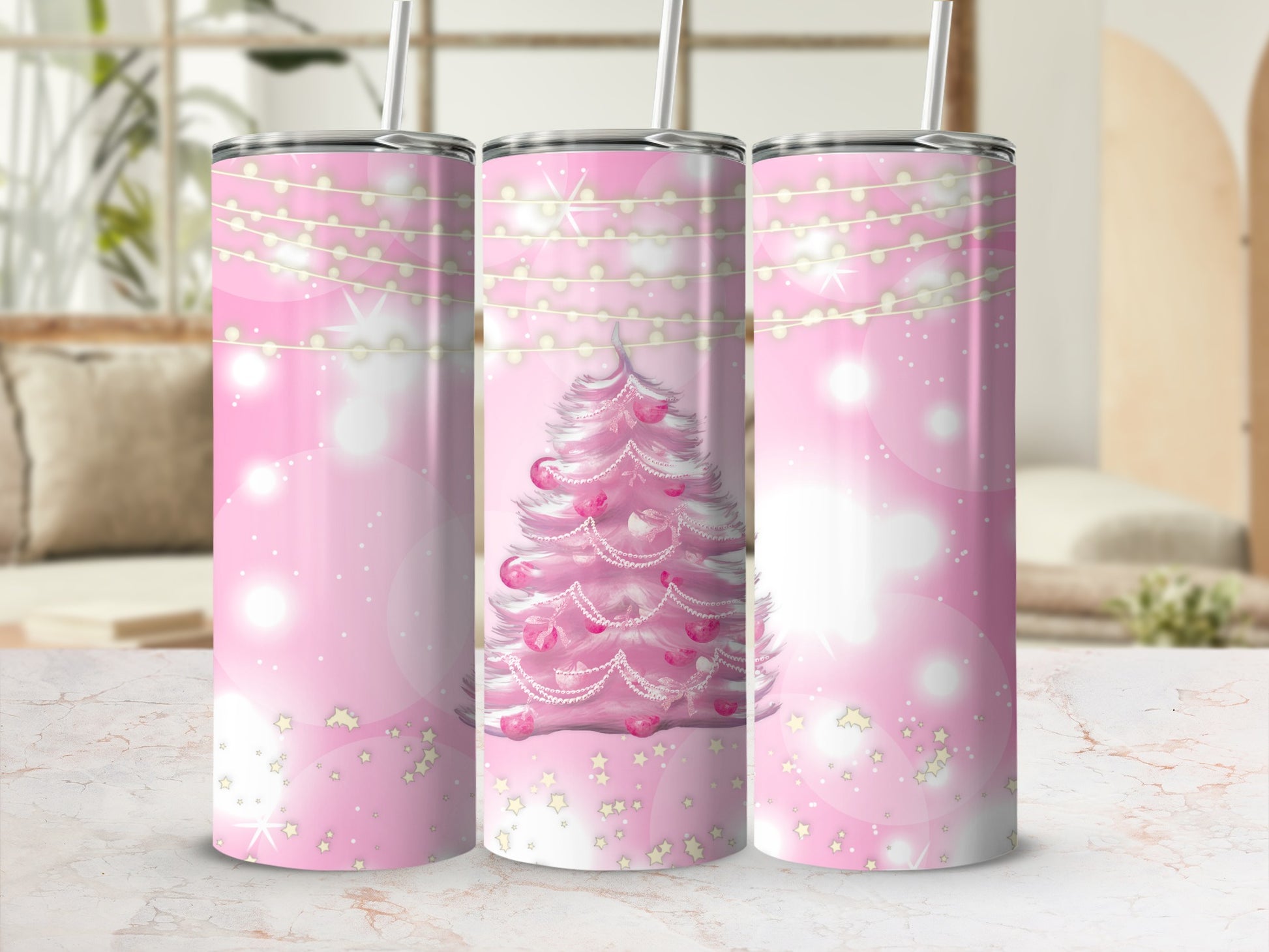 Pink Christmas tree with garland, hearts, and sparkles on a tumbler.