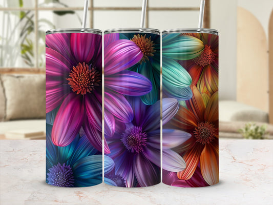 Three tall tumblers with vibrant, abstract floral patterns.