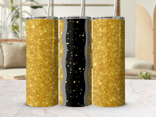 Three glitter tumblers on a marble surface, two gold glitter, one black with gold specks.