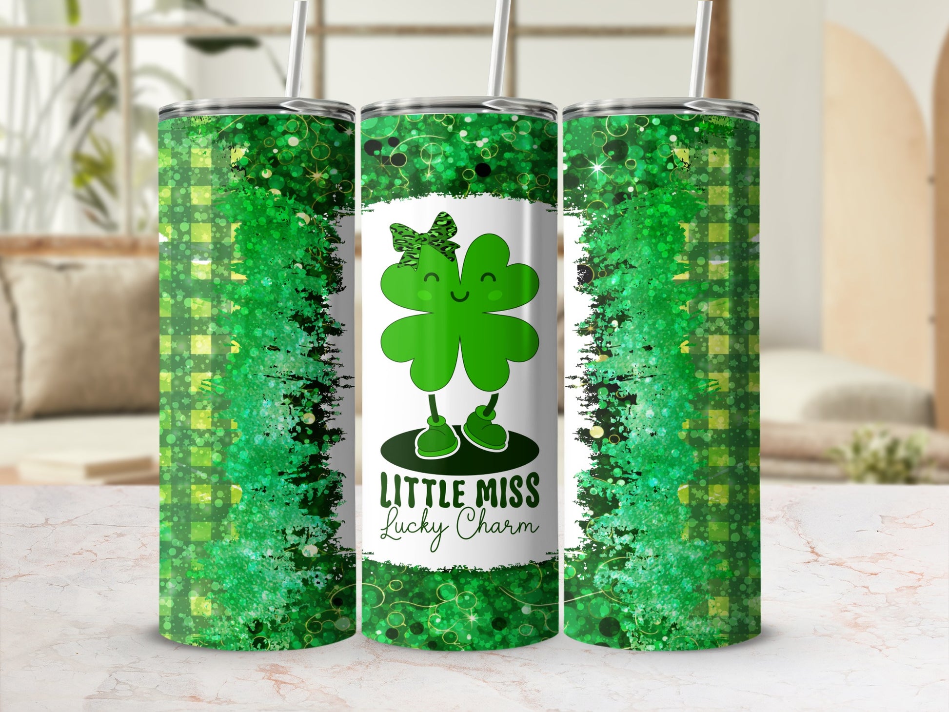 Green tumbler with shamrock and "Little Miss Lucky Charm" text.