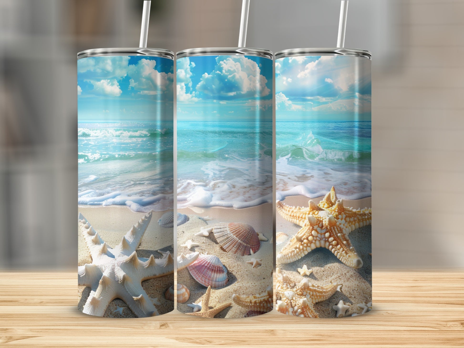 Three tumblers with beach scene, seashells, and starfish.
