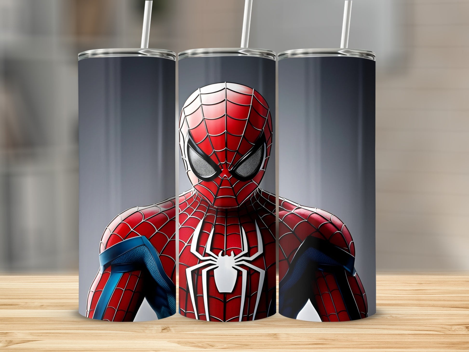 Three tumblers featuring Spiderman's iconic red and blue suit.