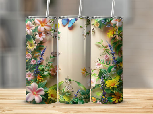 Three tumblers with floral and butterfly designs on a wooden surface.