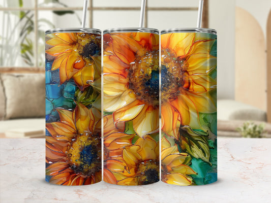 Three tumblers with vibrant sunflower designs and straw lids.