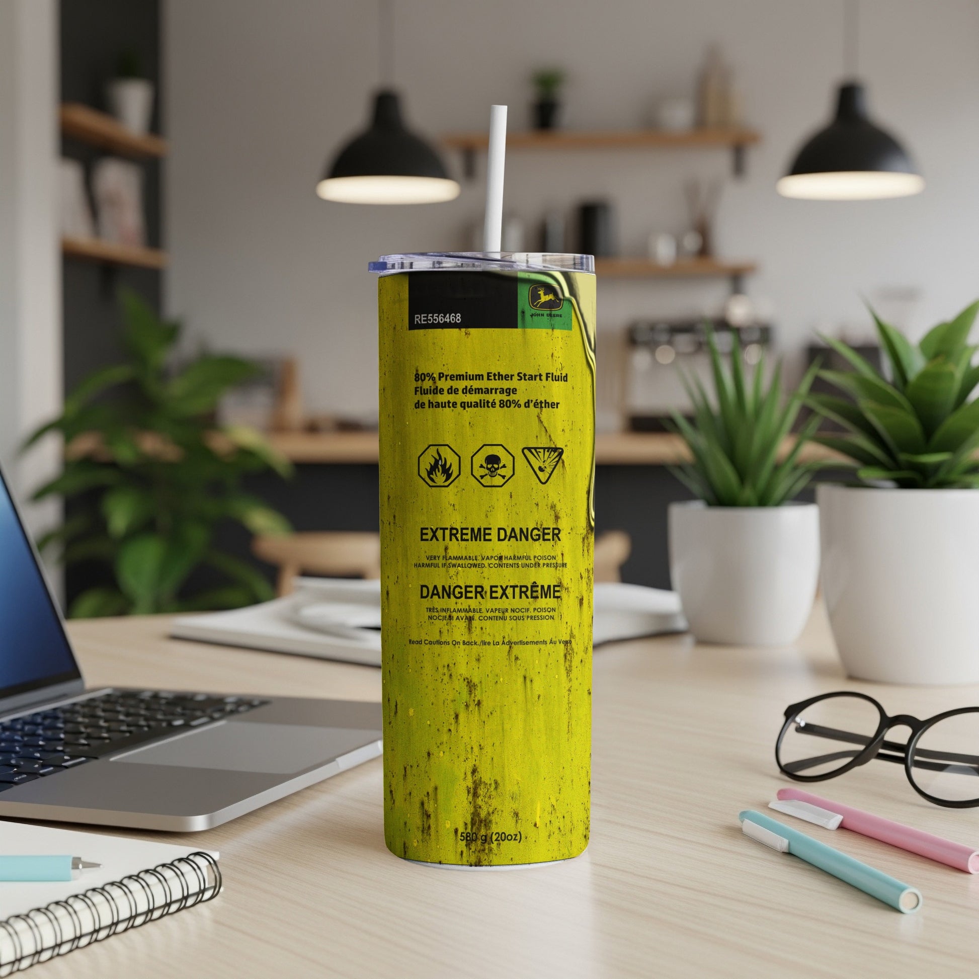 John Deere ether start fluid can with warning labels.
