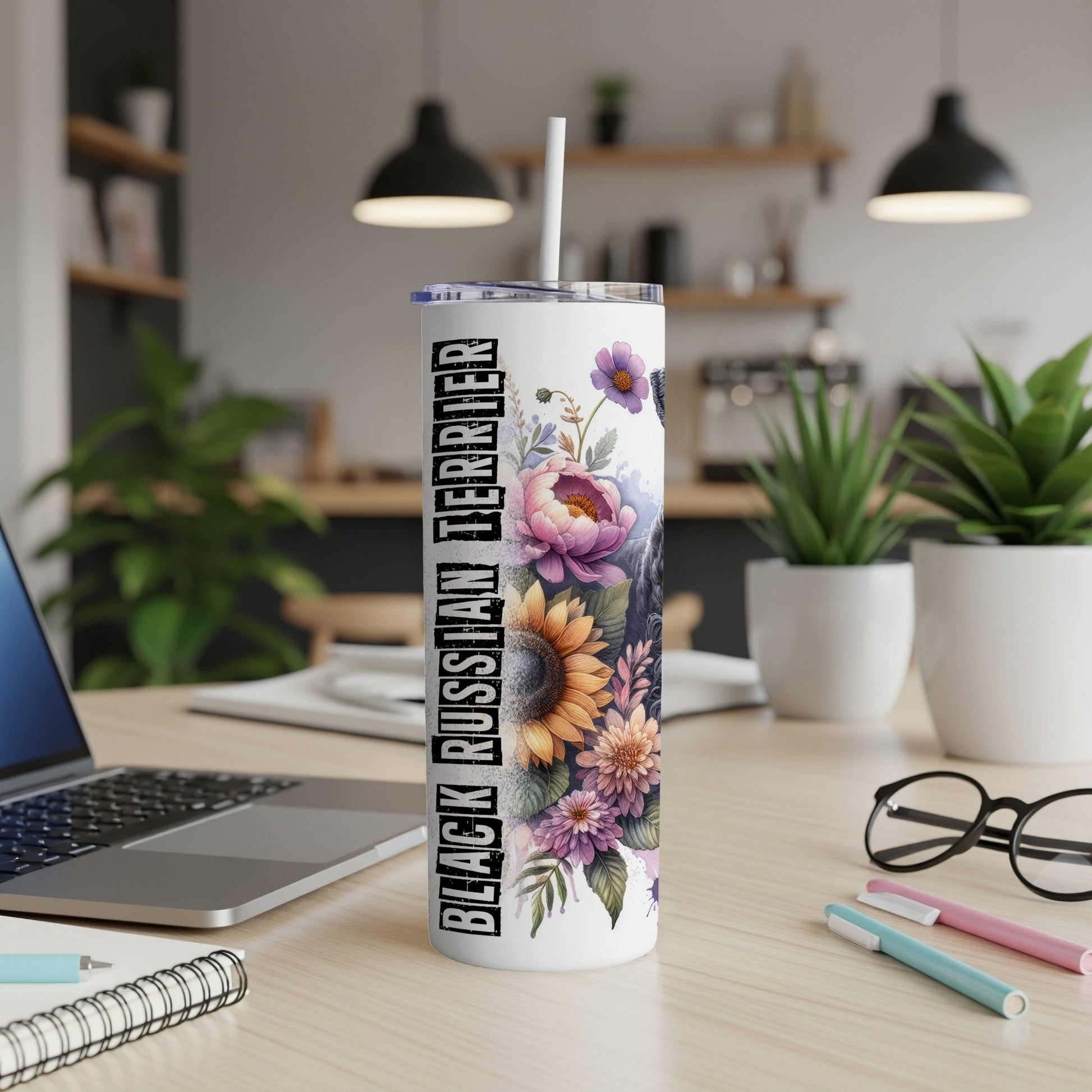 Black Russian Terrier tumbler with floral design and straw.
