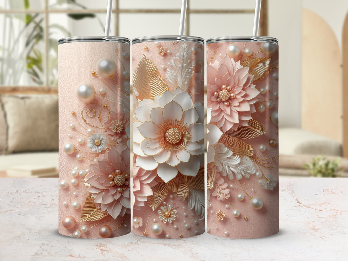 Three pink tumblers with floral and pearl embellishments.