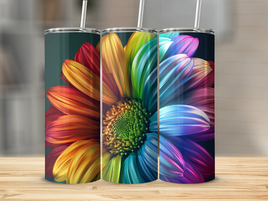 Rainbow flower petals on three tumblers on a wooden surface.