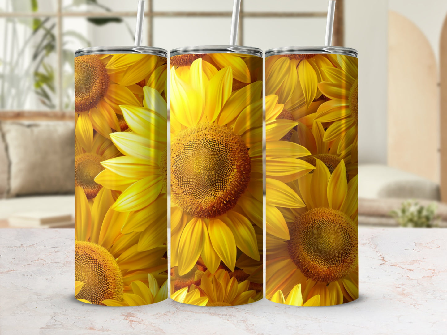 Three tumblers featuring a pattern of bright yellow sunflowers on a white background.