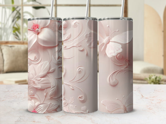 Three pale pink tumblers with floral and butterfly embossed designs.
