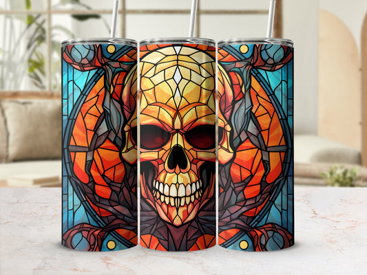 Stained glass skull design on a set of three travel tumblers.