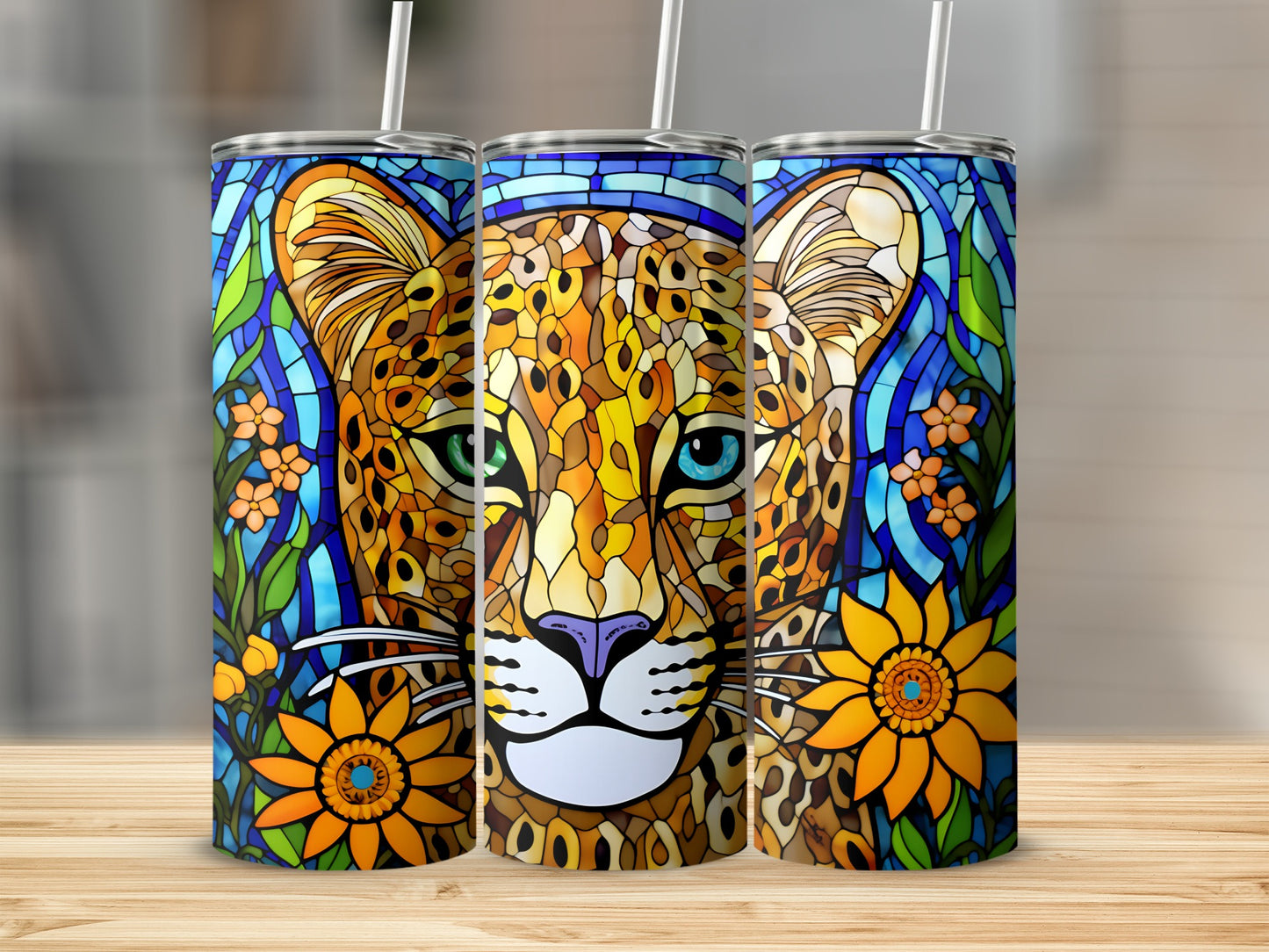 Three stained glass style tumblers featuring a leopard with colorful floral accents.