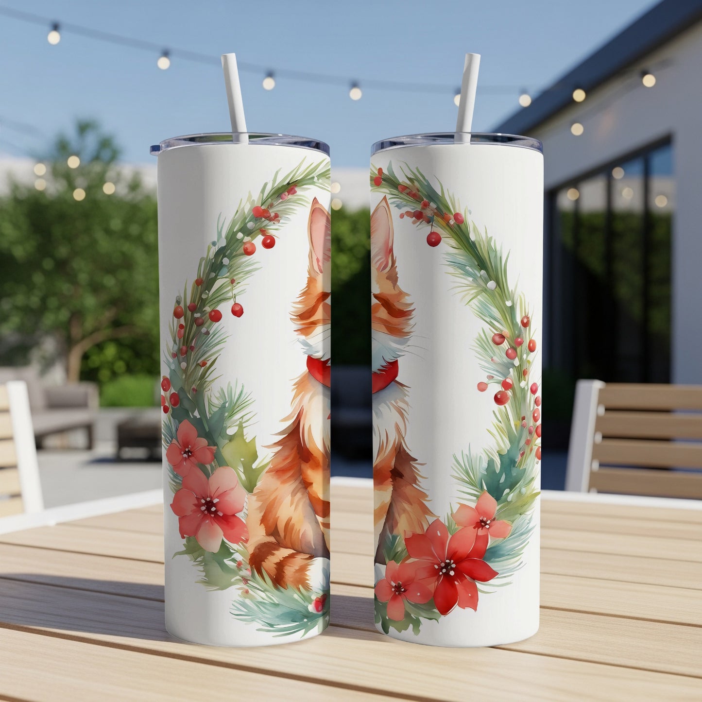 Two tumblers featuring a watercolor illustration of a cat in a festive wreath.