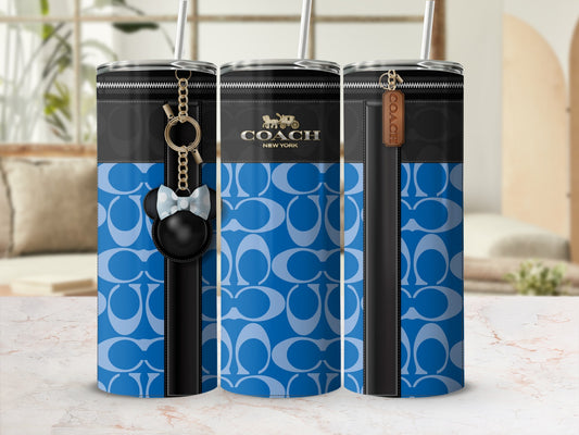 Three Coach tumblers with a blue C pattern and zip accents.