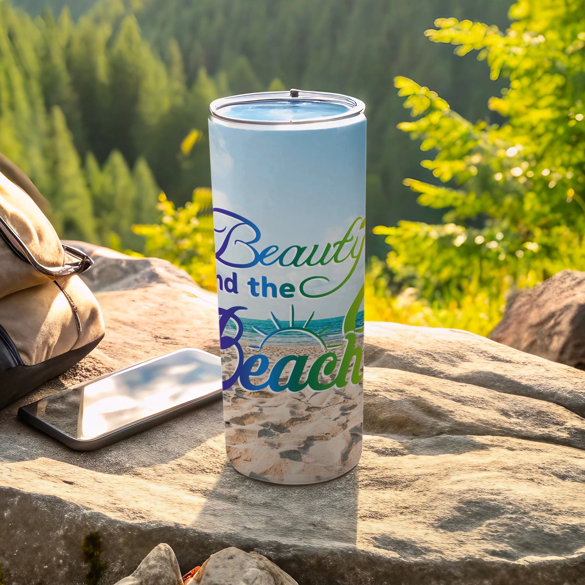 Tall tumbler with "Beauty and the Beach" text and beach scene.