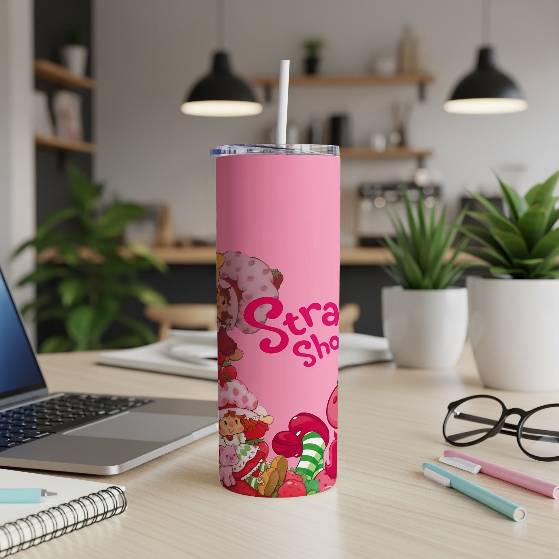 Pink tumbler with Strawberry Shortcake characters and "Strawberry Shortcake" text.