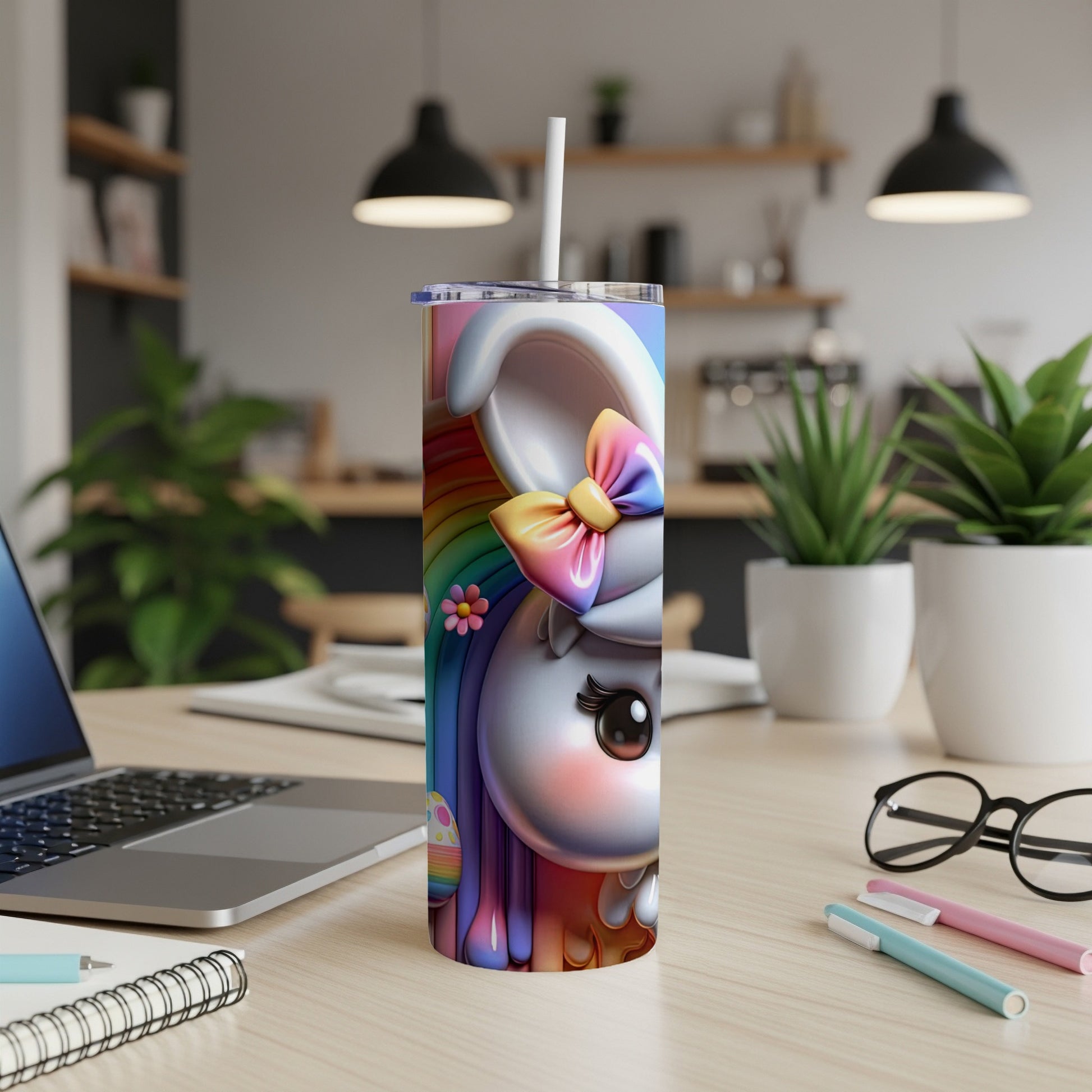 Tall tumbler featuring a cartoon bunny with rainbow accents and a bow.