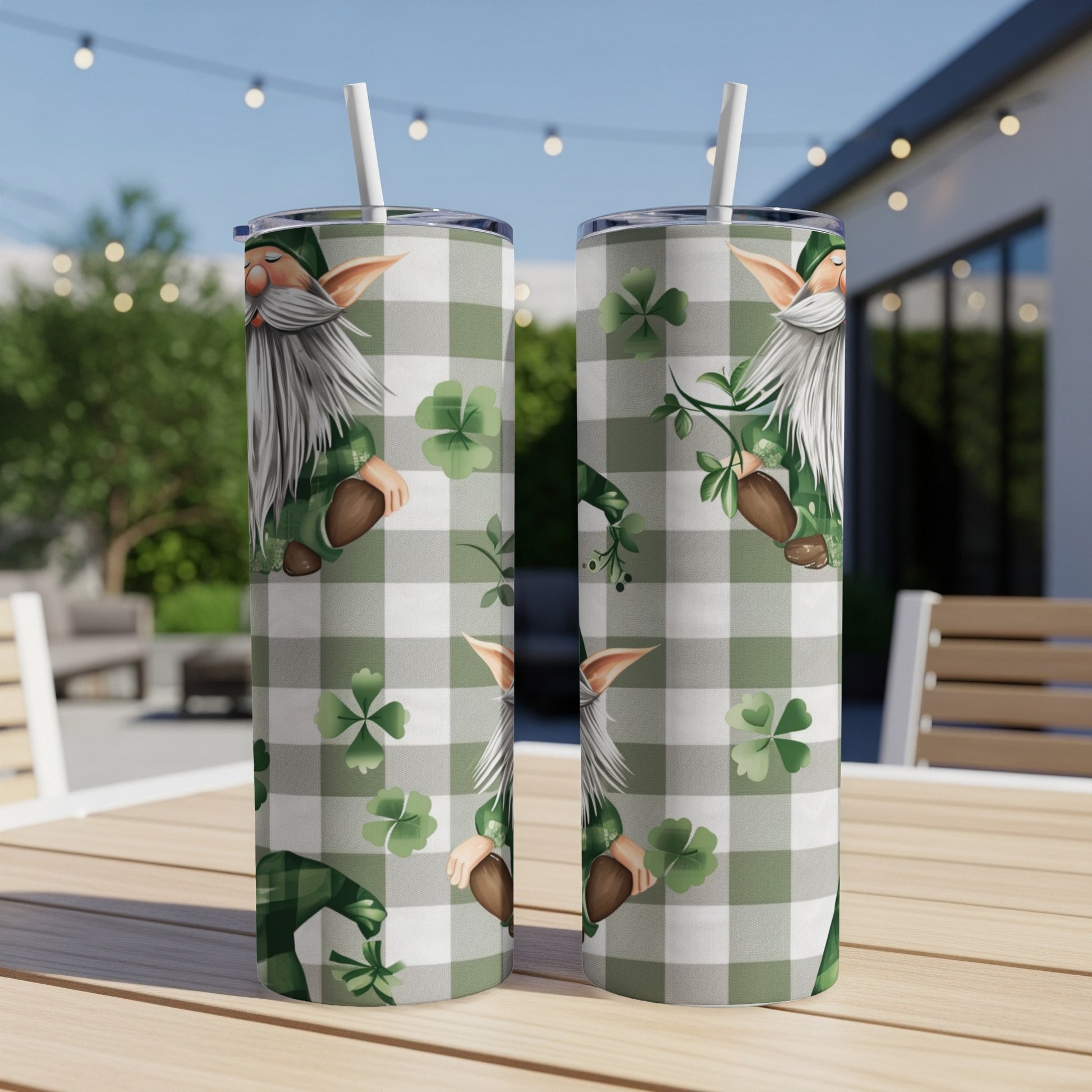 Green plaid tumbler with gnome and shamrock design.
