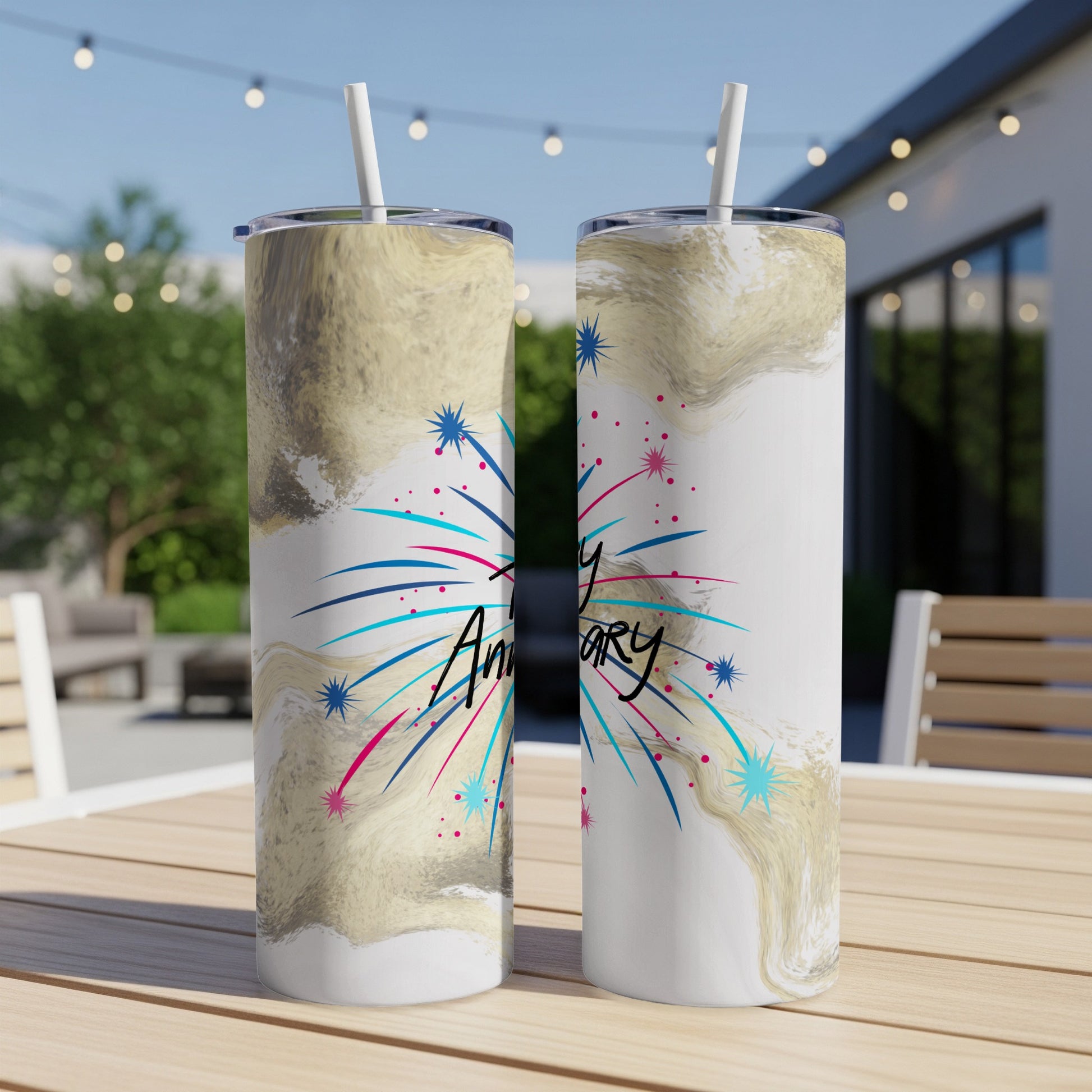 Two tall, white tumblers with marble and fireworks design.