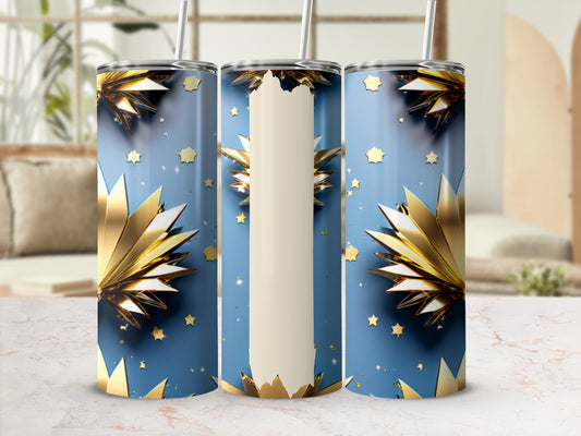 Blue tumbler with gold starbursts and stars pattern, straw visible.