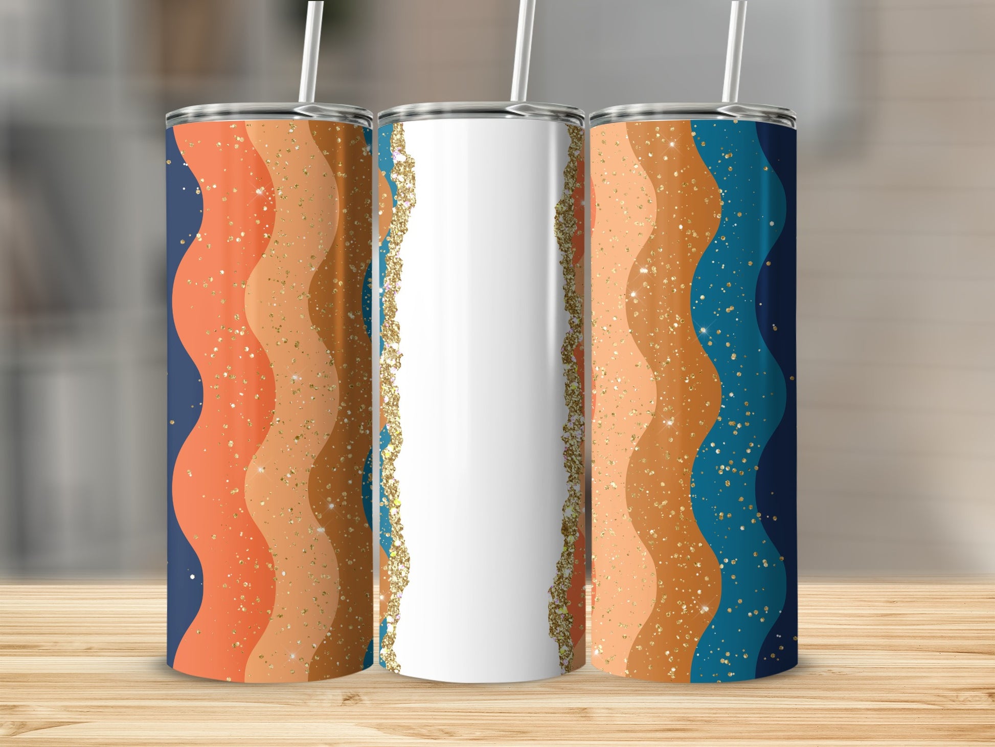 Three tumblers with wavy orange, blue, and gold glitter stripes.