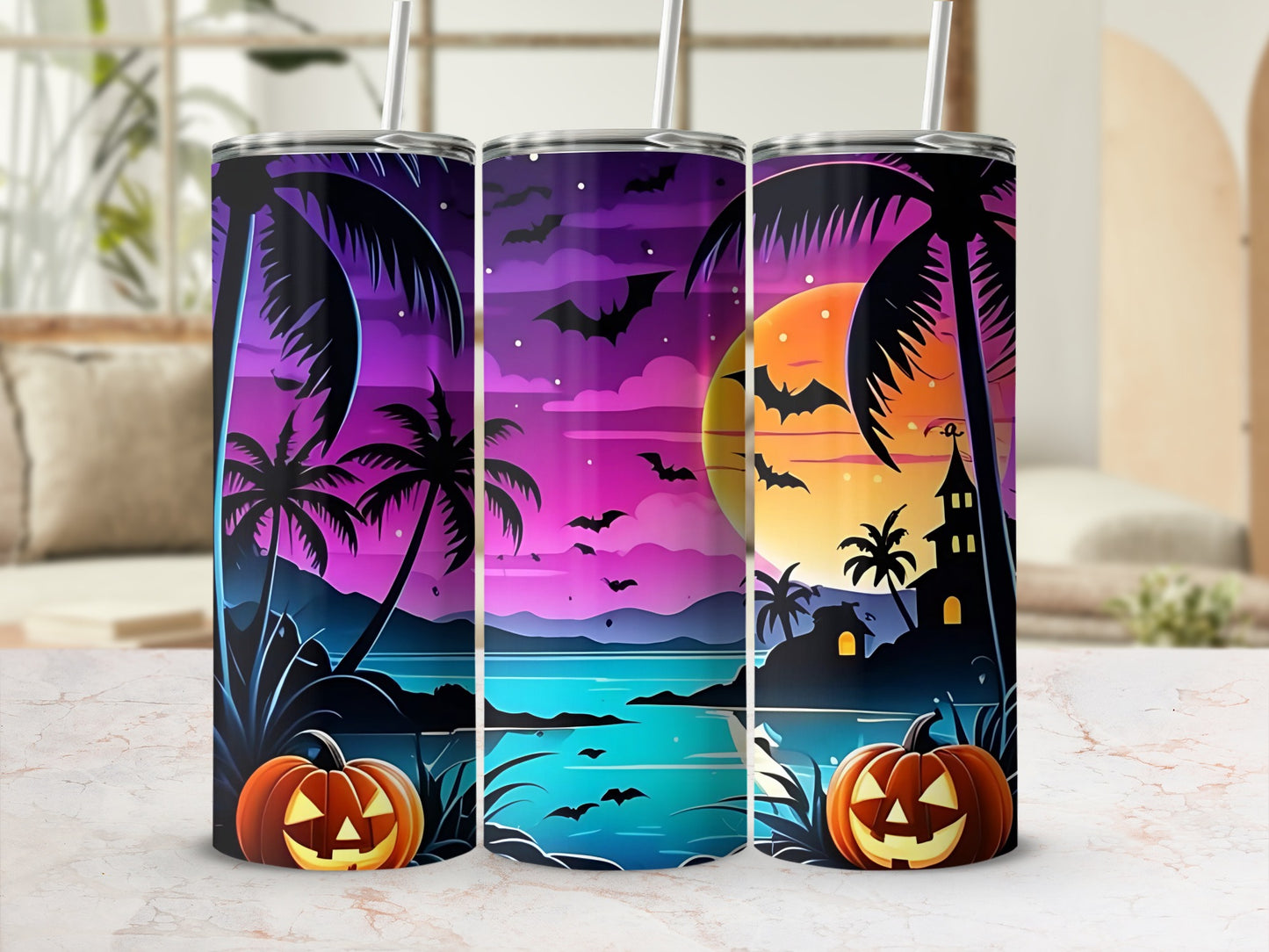 Three tumblers with a Halloween tropical beach scene and jack-o'-lanterns.