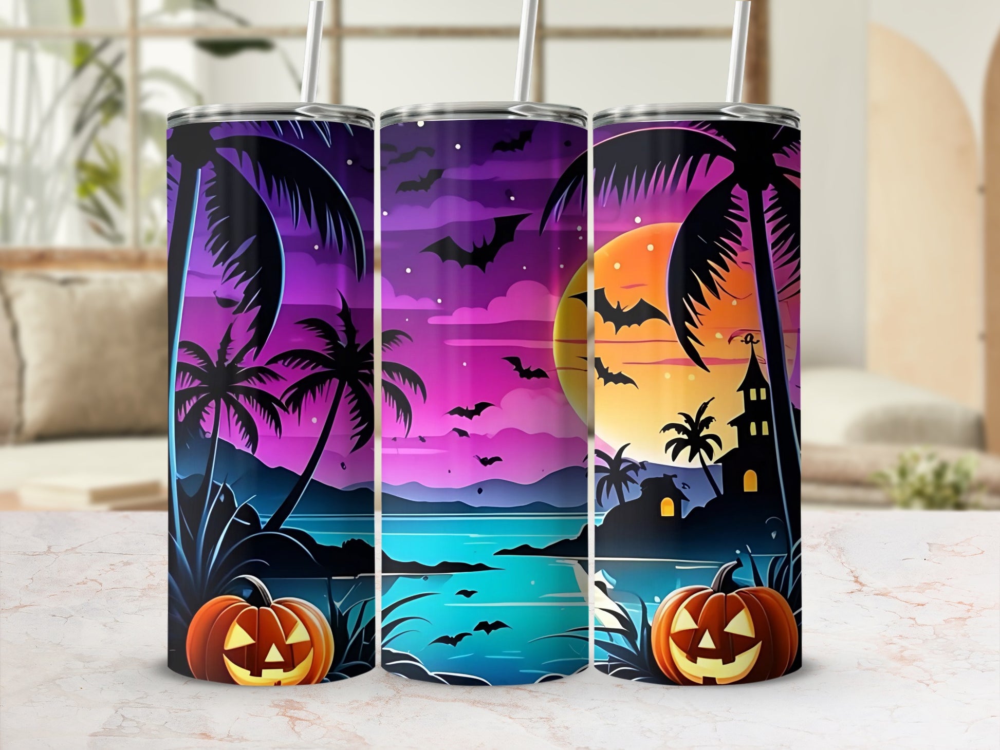 Three tumblers with a Halloween tropical beach scene and jack-o'-lanterns.