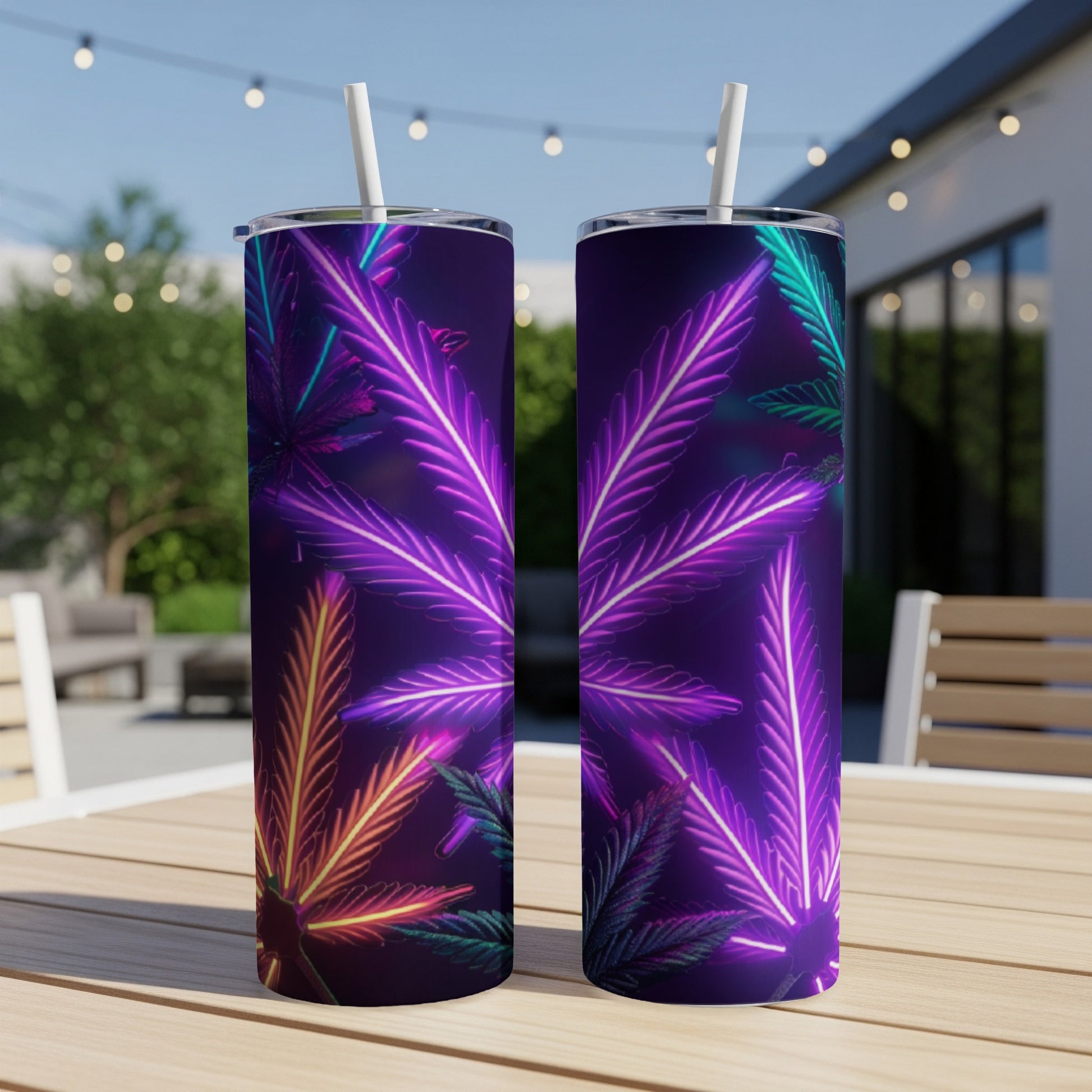 Two purple tumblers with neon green and pink cannabis leaf designs.