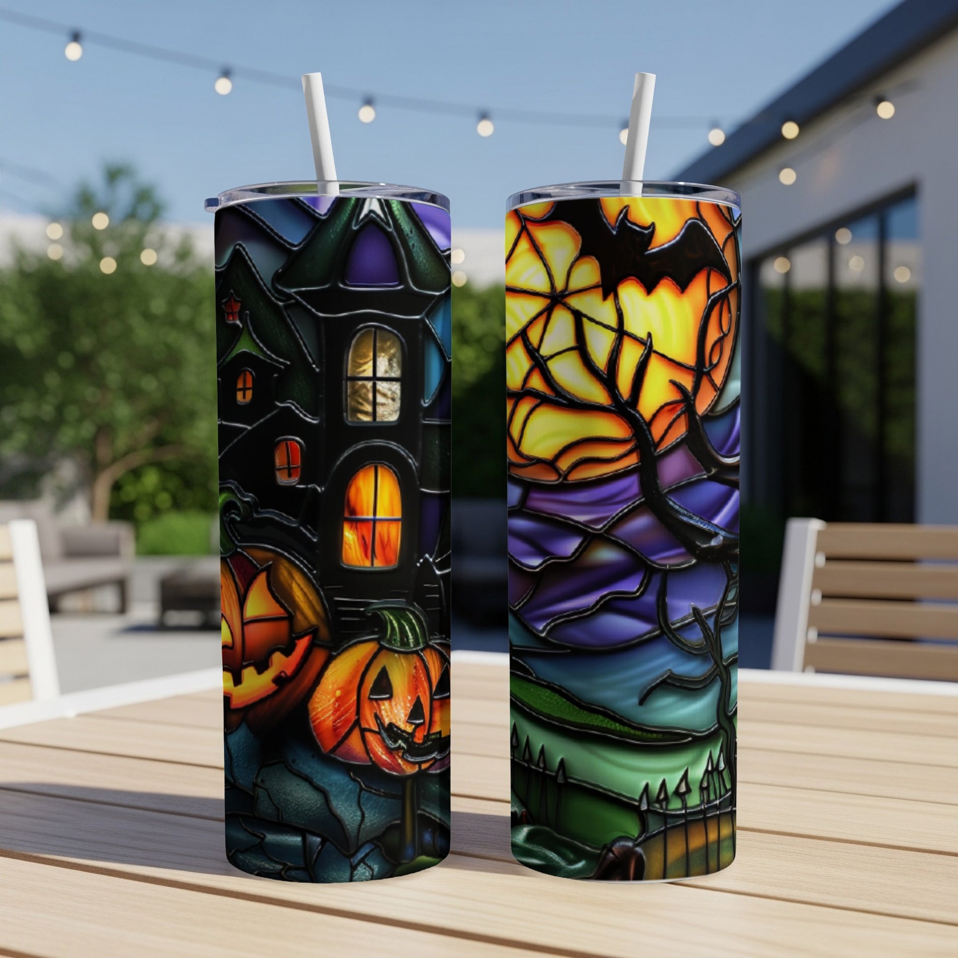 Halloween-themed tumbler with stained-glass style haunted house and jack-o'-lanterns.