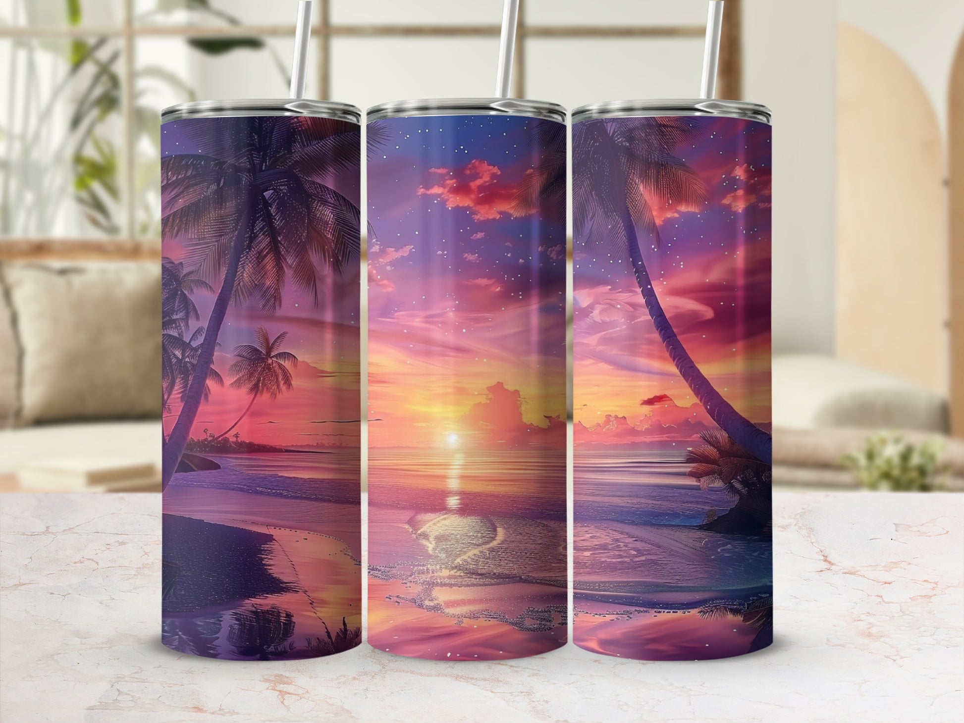 Three tumblers with a tropical sunset beach scene.