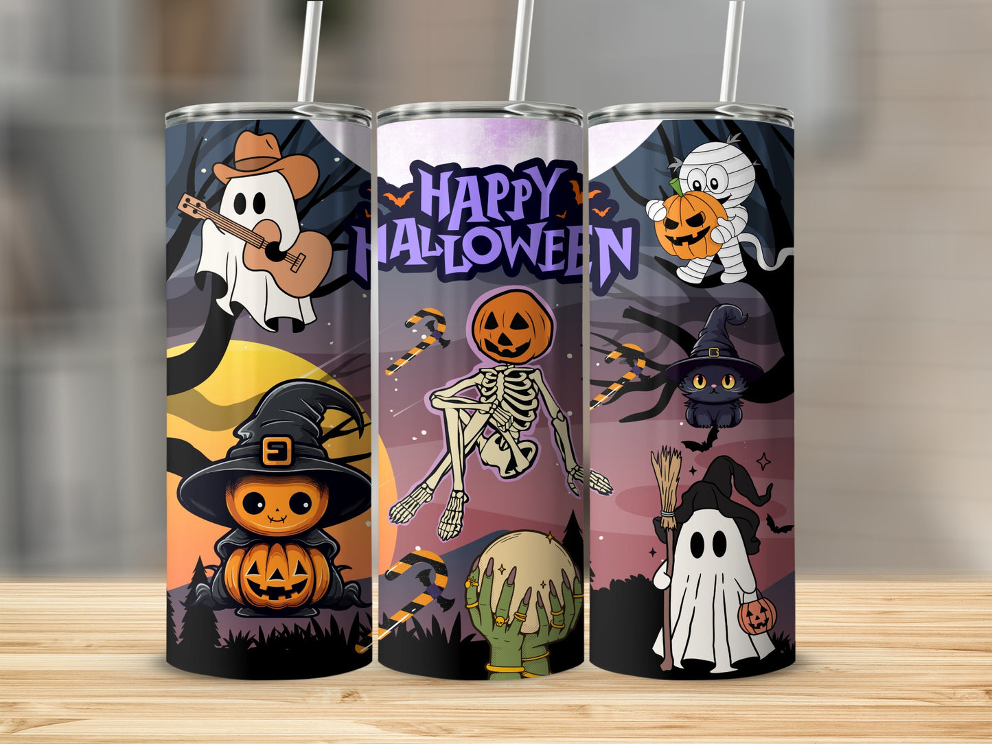Three tumblers with Halloween theme: ghost playing guitar, skeleton, and mummy.