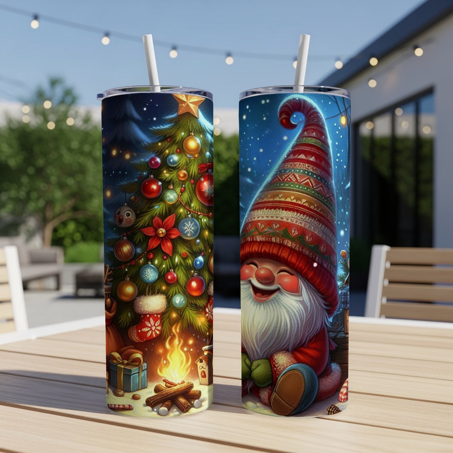 Two Christmas-themed tumblers, one with a decorated tree and gifts, the other with a smiling gnome.