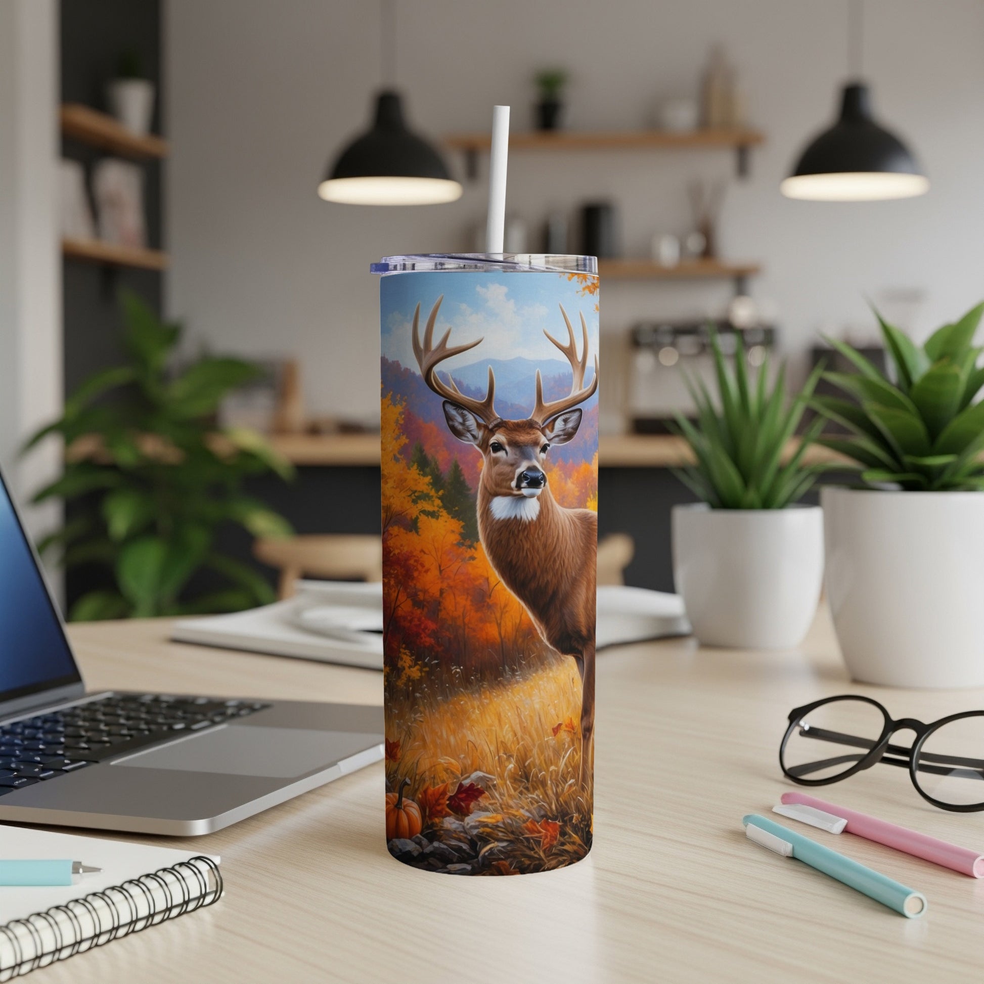 Deer in autumn forest on a skinny tumbler with a straw.