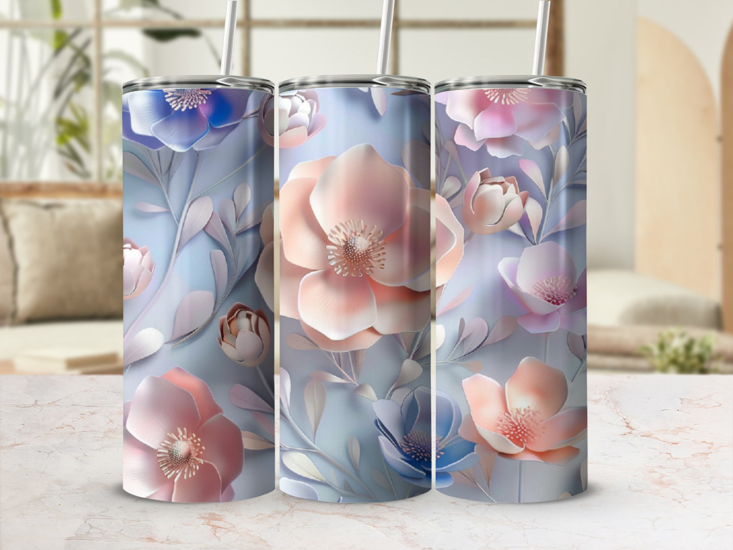 Three floral tumblers with pink, blue, and purple flowers.