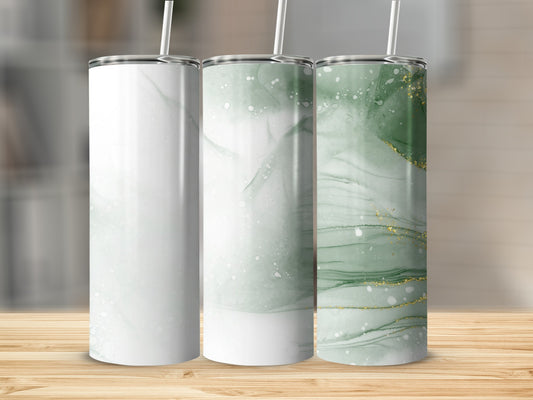 Three blank tumblers with marbled green and gold patterns on a wooden surface.