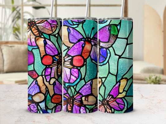 Three tumblers with a stained glass butterfly pattern.