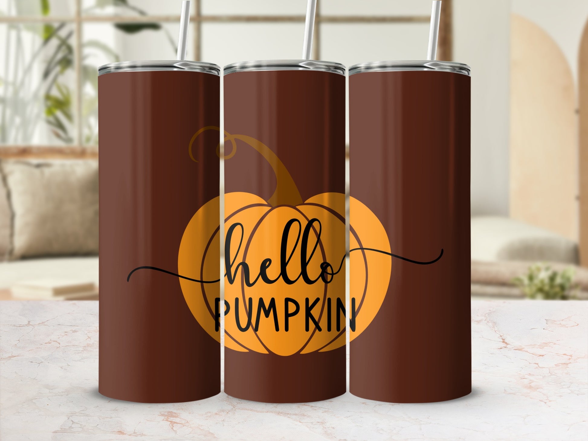 Three brown tumblers with "Hello Pumpkin" text and a pumpkin graphic.