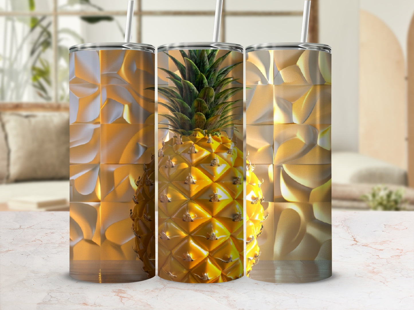 Three tumblers with a golden, textured pineapple design.