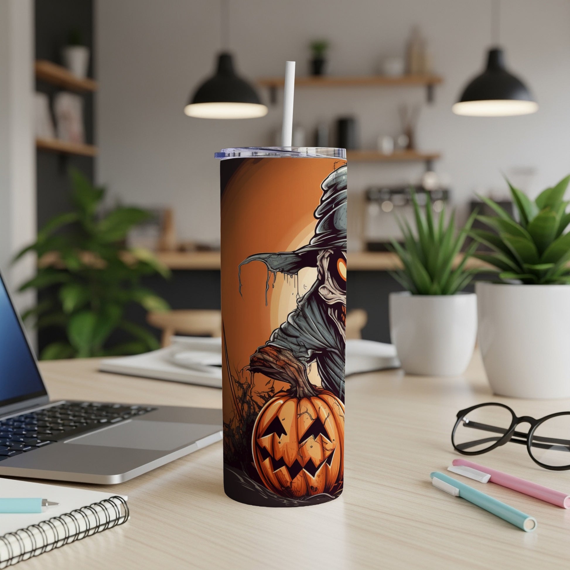 Tumbler with Halloween scarecrow and jack-o'-lantern design.