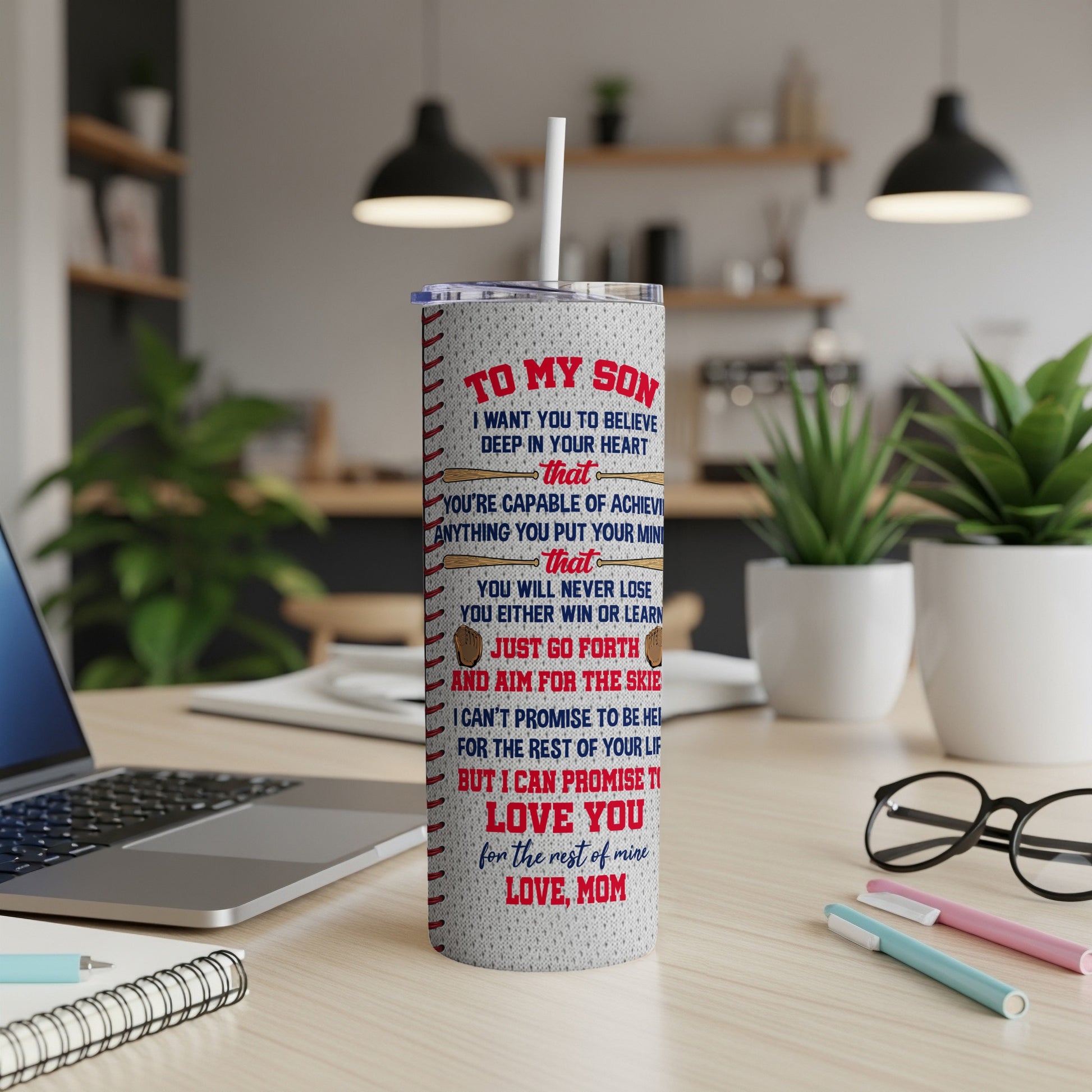 Tumbler with motivational message for son from mom, featuring baseball stitching.