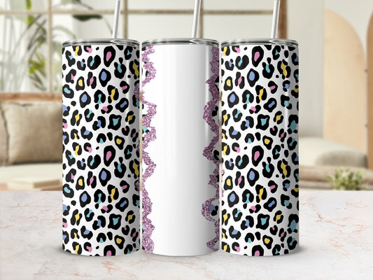 Three tumblers with a colorful leopard print pattern and glitter trim.