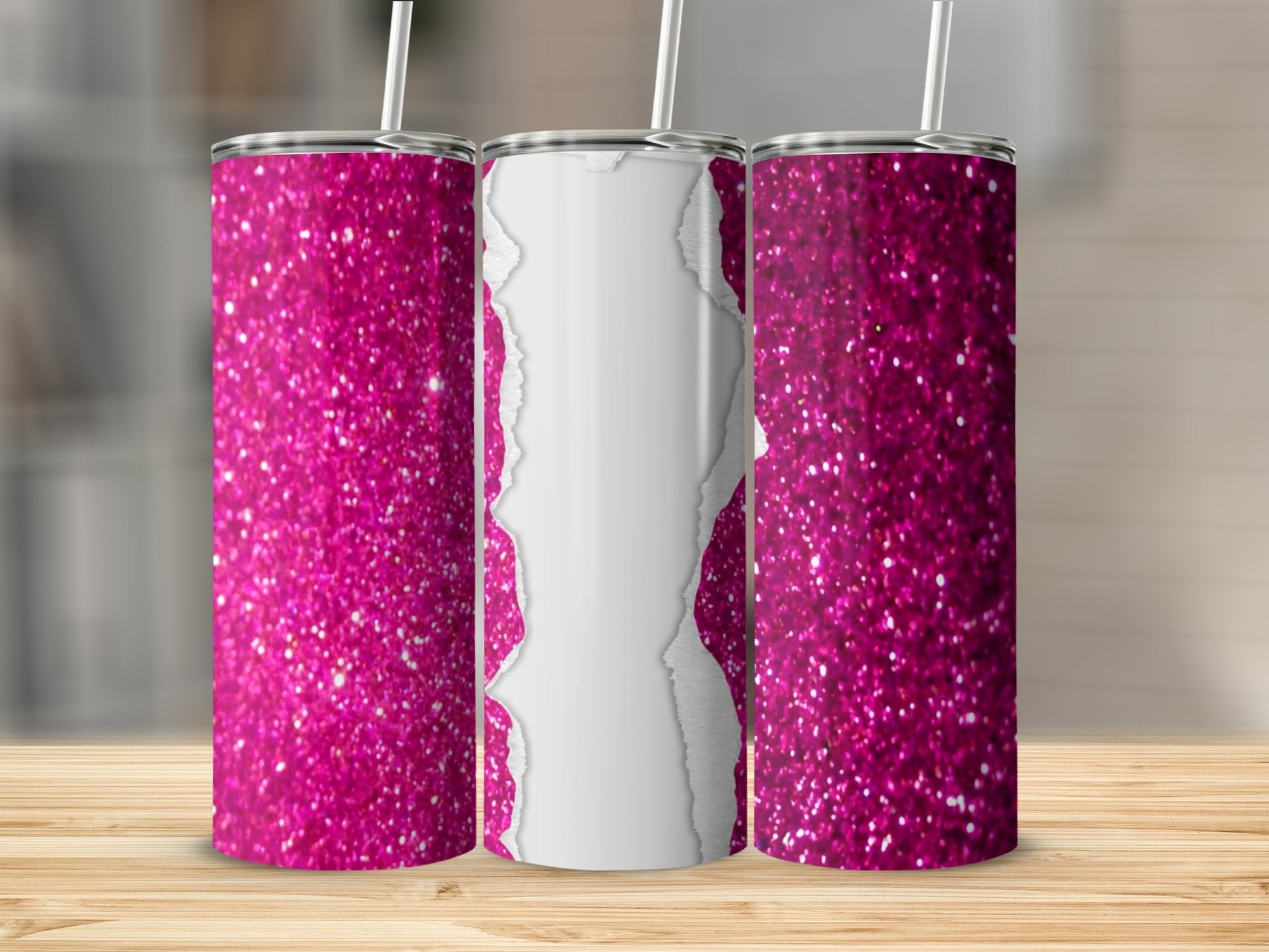Three pink glitter tumblers with torn paper effect on a wooden surface.