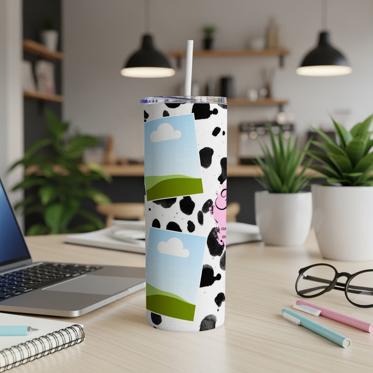 Tumbler with cow print, two landscape photos, and pink text.