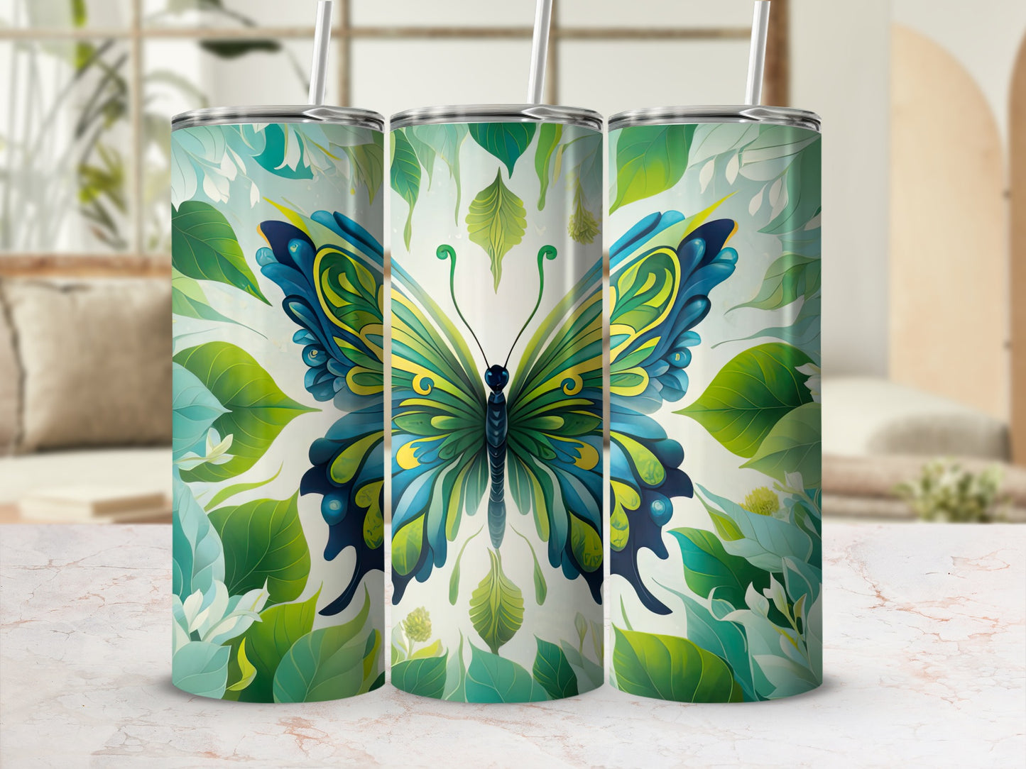 Three tumblers featuring a detailed blue and green butterfly surrounded by leaves.