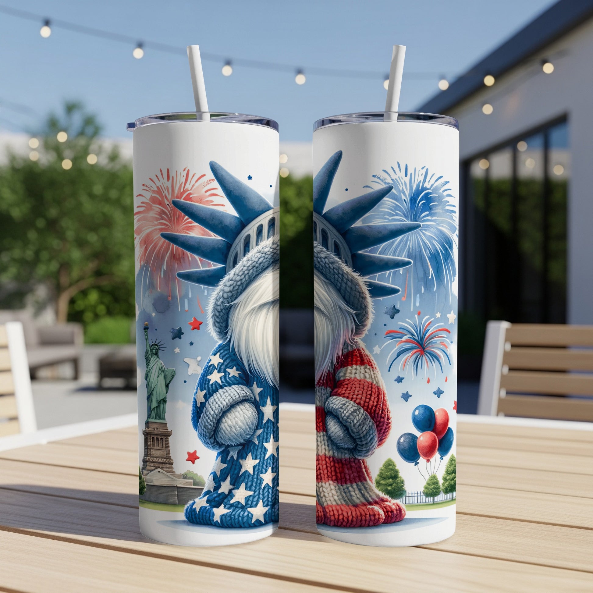 Two tumblers with a patriotic gnome dressed as the Statue of Liberty.
