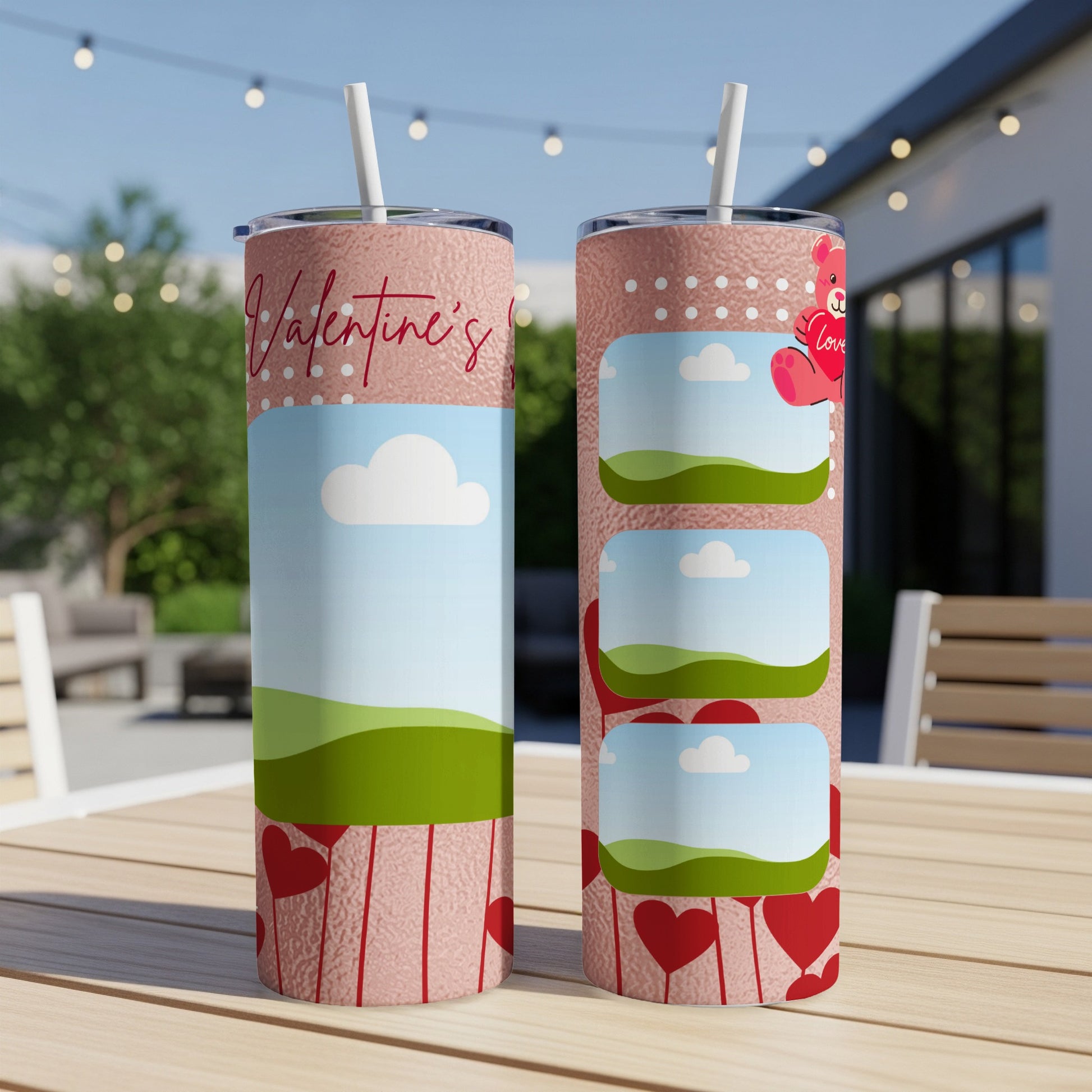 Two Valentine's Day themed tumblers with hearts and cartoon landscapes.