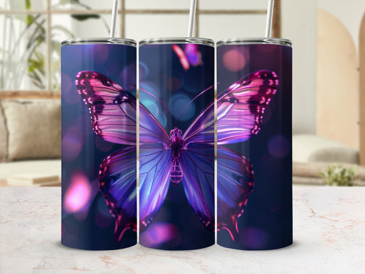 Purple butterfly design on a blue tumbler with bokeh lights.