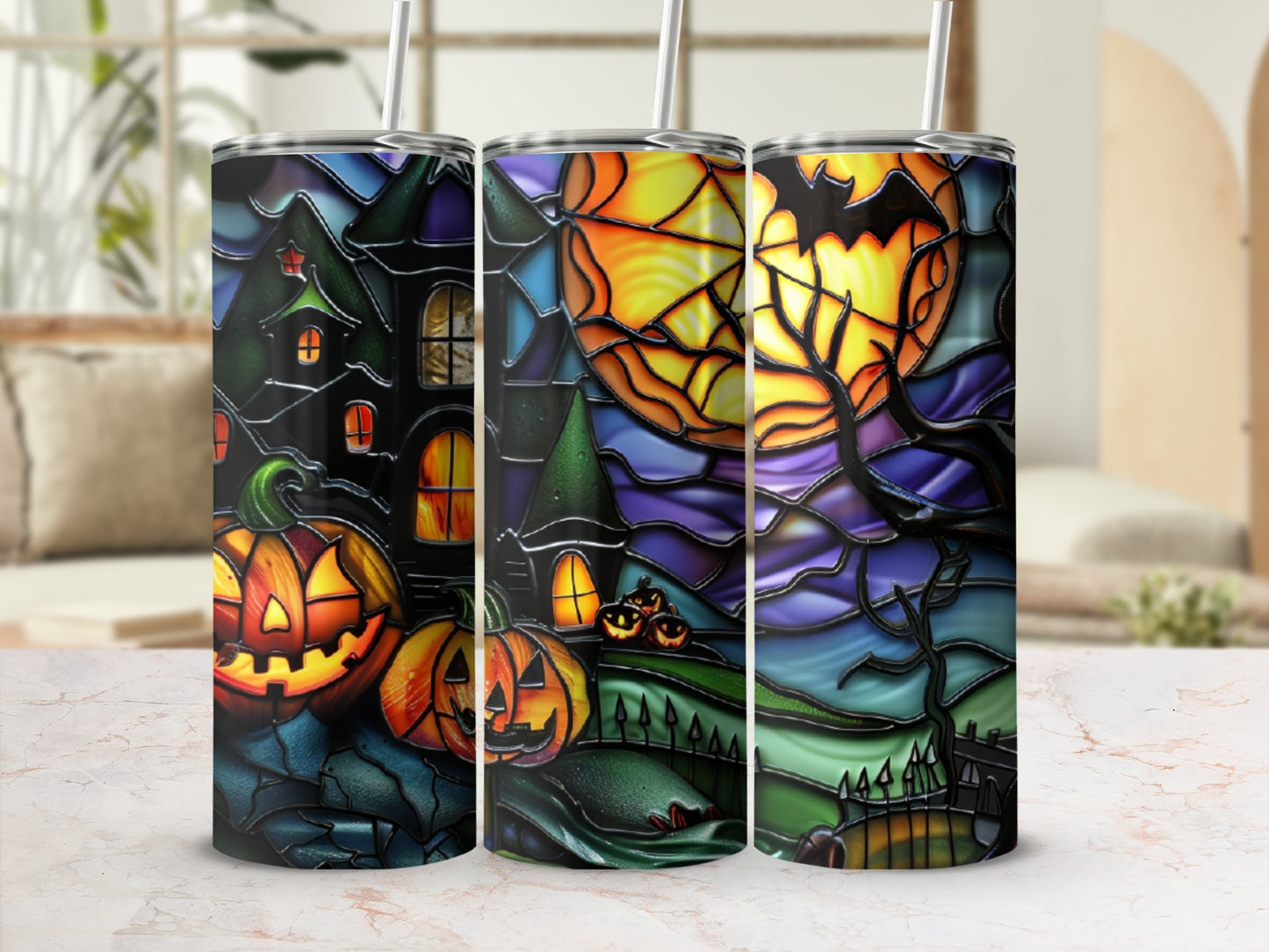 Stained glass tumbler with Halloween pumpkins, spooky houses, and a full moon.