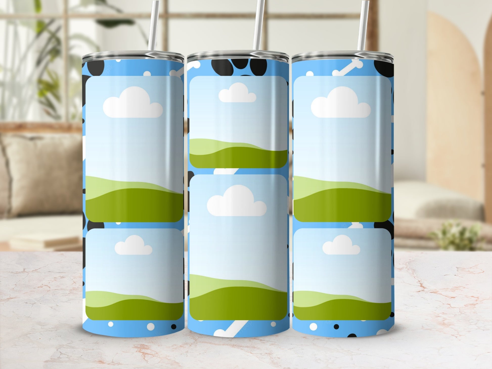 Three tumblers with a cow-print pattern and six photo frames of cartoon landscapes.