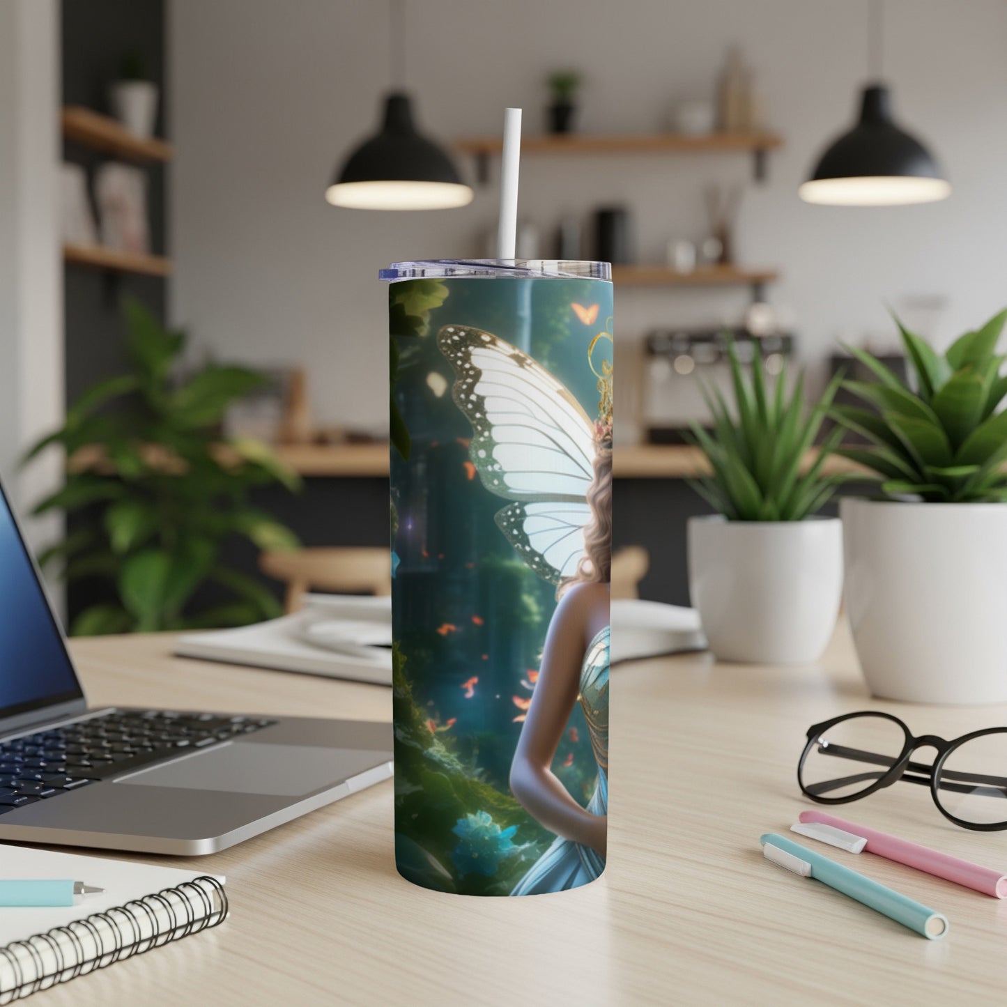 Fairy with butterfly wings on a colorful tumbler with a straw.
